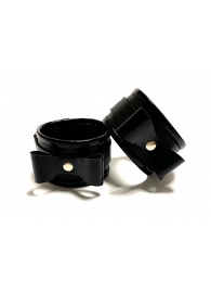Черные наручники с бантиками из эко-кожи - БДСМ Арсенал - купить с доставкой в Санкт-Петербурге