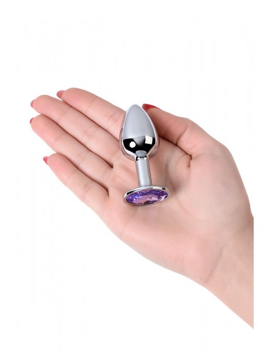 Серебристая конусовидная анальная пробка с фиолетовым кристаллом - 7 см. - ToyFa - купить с доставкой в Санкт-Петербурге