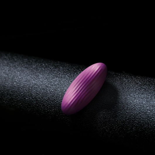 Фиолетовый клиторальный стимулятор Edeny с управлением через приложение - Svakom