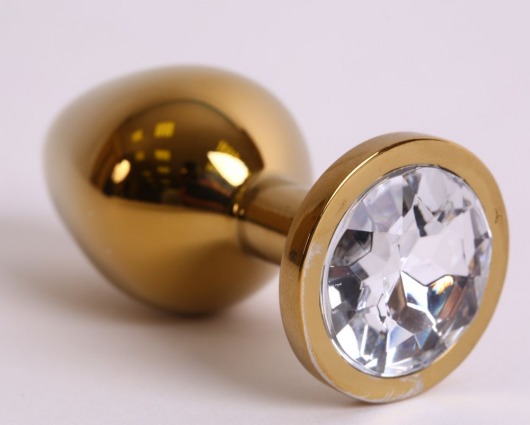 Золотистая анальная пробка с прозрачным кристаллом - 8,2 см. - 4sexdreaM - купить с доставкой в Санкт-Петербурге