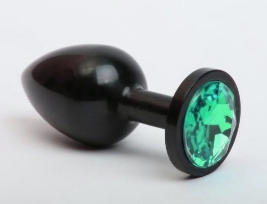 Чёрная анальная пробка с зелёным стразом - 7,6 см. - 4sexdreaM - купить с доставкой в Санкт-Петербурге